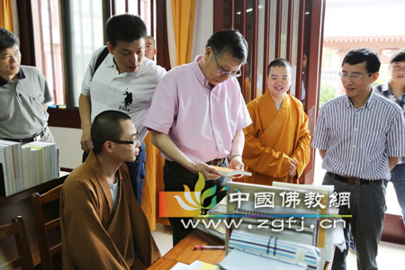 浙江省政协副主席陈加元一行来中国佛学院普陀山学院调研.jpg