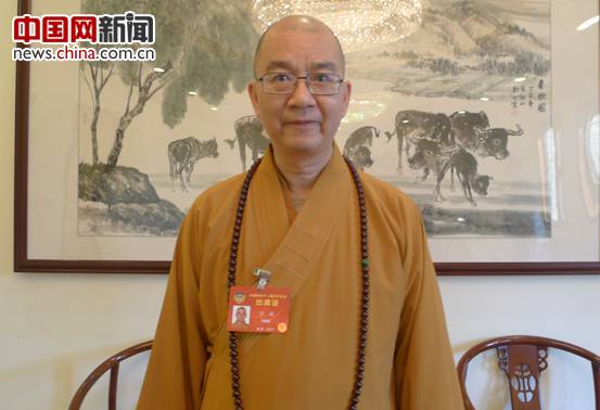 全国政协常委、中国佛教协会会长学诚法师接受中国网采访。中国网 李智/摄